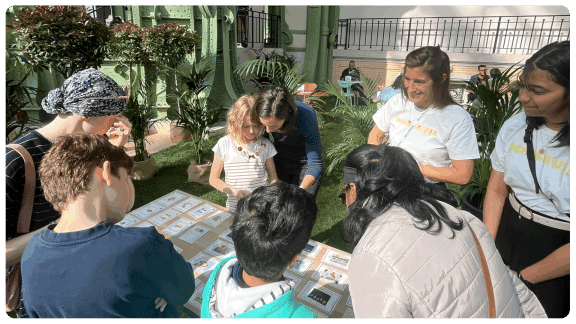Vanessa and teachers working with students